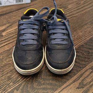 Blue and yellow Geox sneakers with zip and Velcro side closure.